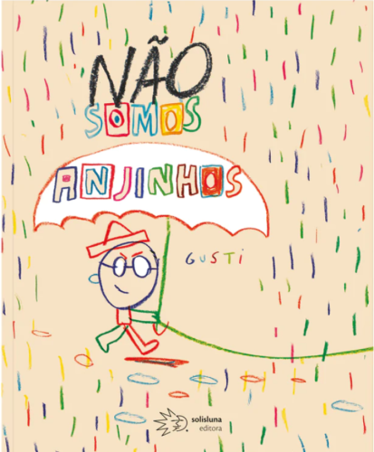  Capa do livro “Não somos anjinhos”, com título escrito com diferentes cores. Ilustração mostra pessoa de óculos e chapéu andando com guarda-chuva enquanto pingos coloridos caem em redor. Fim da descrição.